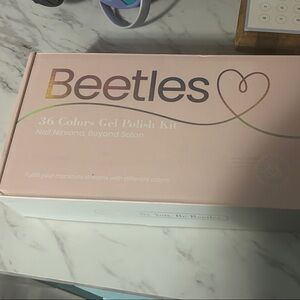 Brand new never been used Beetles Gel Polish Kit - 36 Colors with led nail light